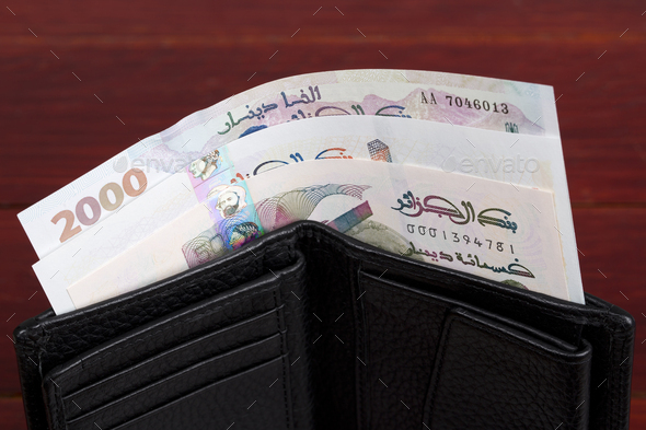 Algerian money in the black wallet - Stock Photo - Images