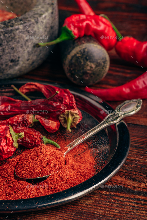 Spoonful of ground chili pepper Stock Photo by Seva_blsv PhotoDune