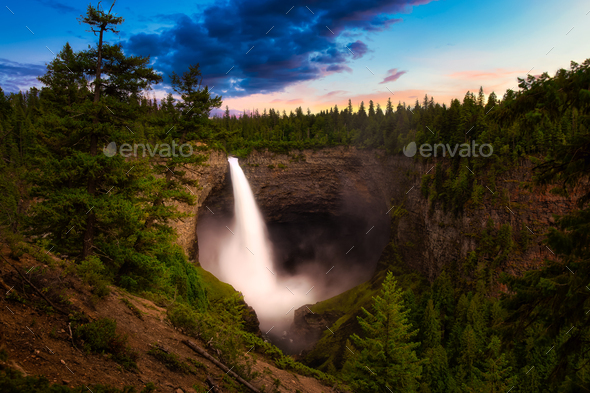 View of a waterfall, Helmcken Falls, in the Canadian Mountain Landscape - Stock Photo - Images