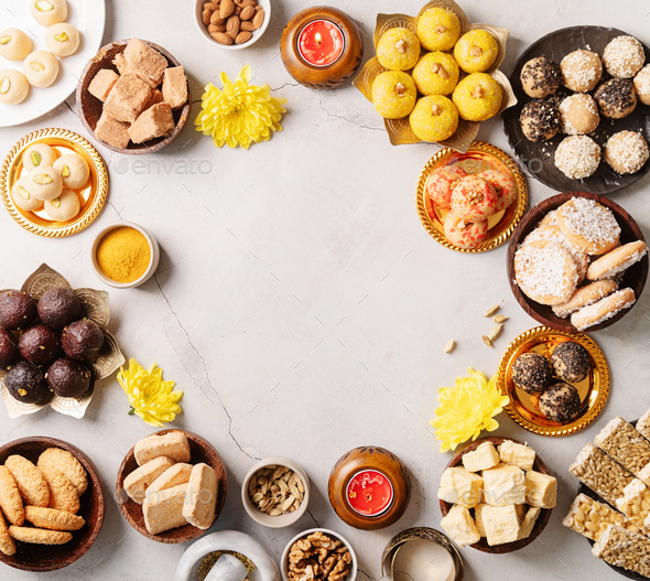 traditional indian sweets on concrete background flat lay Stock Photo by  ilonadesperada