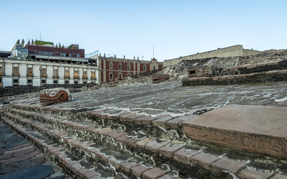 Aztec Temple (Templo Mayor) and serpent head at ruins of Tenochtitlan - Mexico City, Mexico