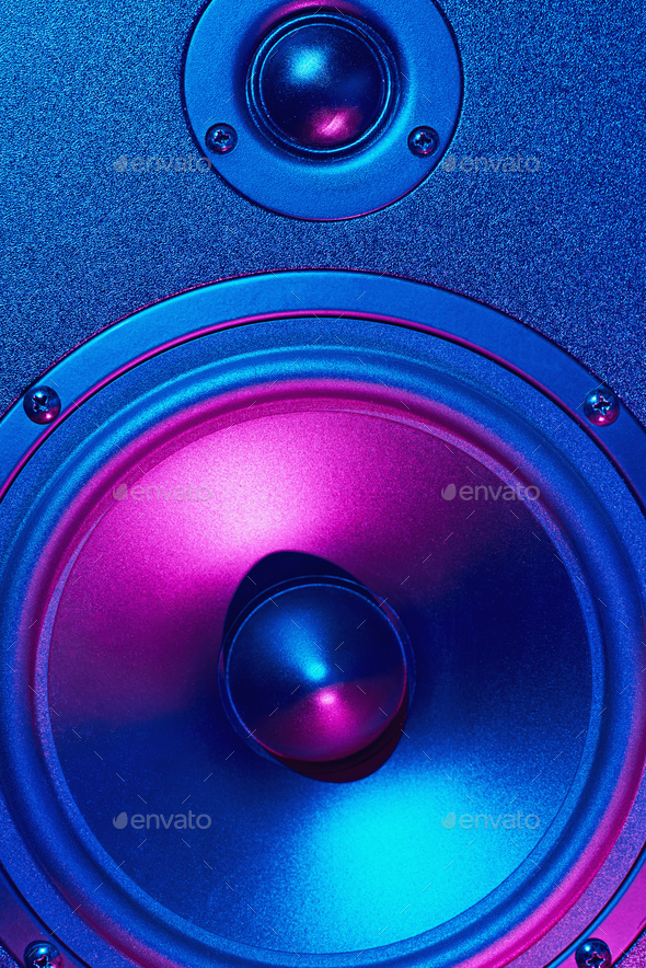 Sound audio speaker with neon lights. Dynamic monitor close up. Creative backgroound
