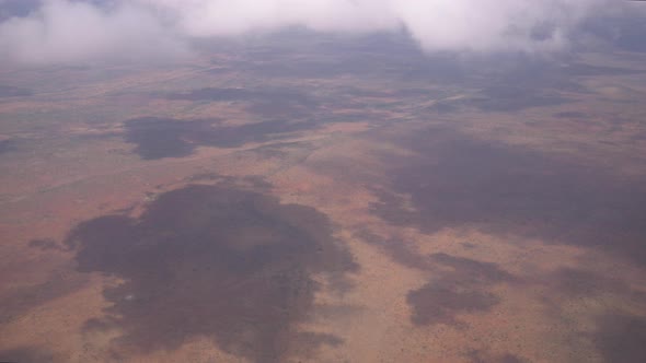 Maasai Mara and clouds  alt