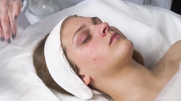 Woman Receiving Ultrasound Cavitation Facial Peeling