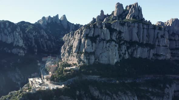 Panorama of famous mountain range of Spain: popular historical sightseeing in gorge at sunny day alt