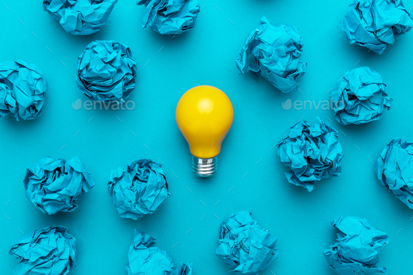 Great Idea Concept with Crumpled Office Paper and Light Bulb - Stock Photo - Images