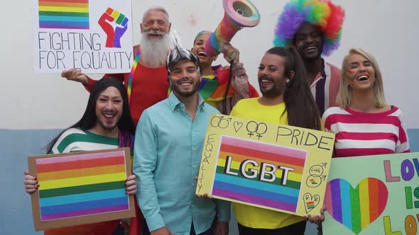 Happy Multiracial people celebrating gay pride event alt