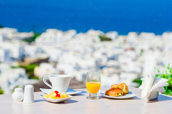 Perfect luxury breakfast table outdoors on Mykonos, Greece, Europe