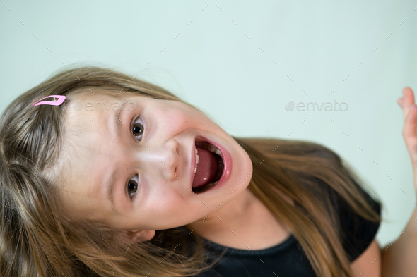 portrait little girl open mouth 