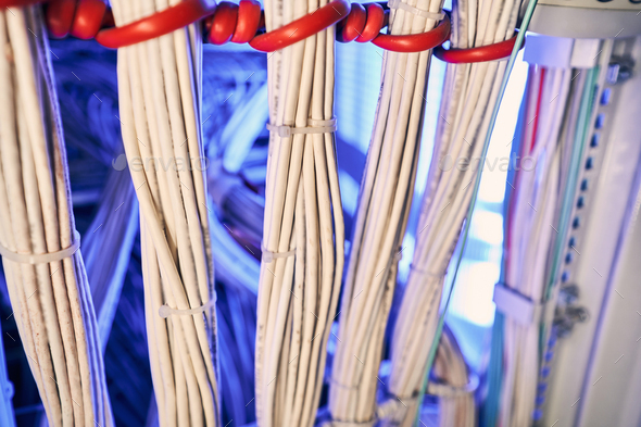 Vertical cable management in data center server cabinet