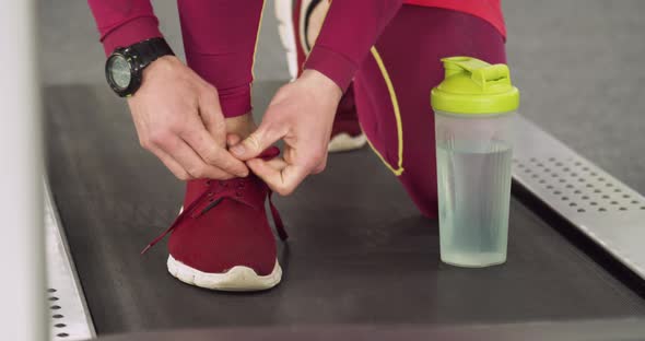 Runner Tying a Sneakers