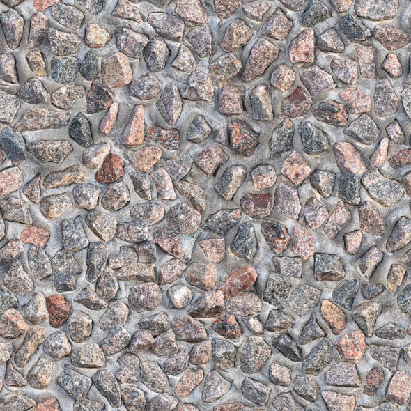 Concrete wall with stone inclusions - Stock Photo - Images