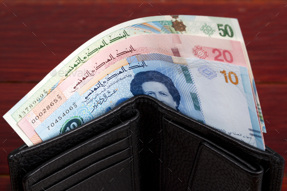 Tunisian money in the black wallet - Stock Photo - Images