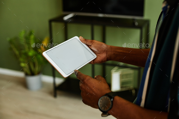 Black Man Operating Smart Home Closeup