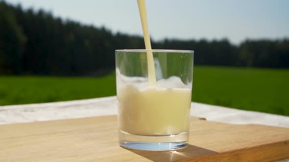 Pouring Milk Into a Glass alt