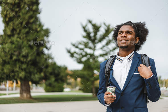 young african american businessman walking to his first job