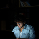 Young indian businessman student working online at night using laptop. - PhotoDune Item for Sale
