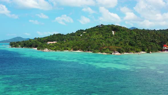 Beautiful tropical island with palm forest red houses and turquoise sea water. Luxury vacation, Thai alt