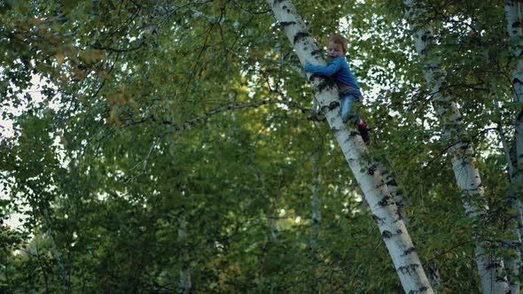 Young Beautiful Mother is Watching Her Children alt