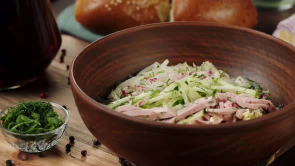 Sprinkling Greenery Dill and Parsley Into Salad Closeup Cooking Okroshka Summer Cold Soup alt