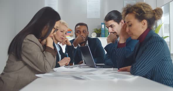 Afroamerican Man Dreaming Sitting at Table During Business Meeting alt