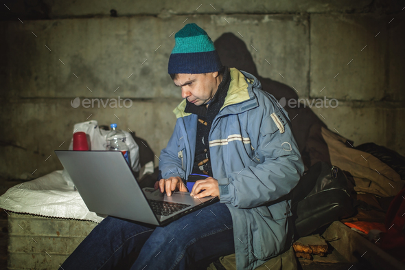 Ukrainian journalist sits in bomb shelter, works and posts the latest news about the war