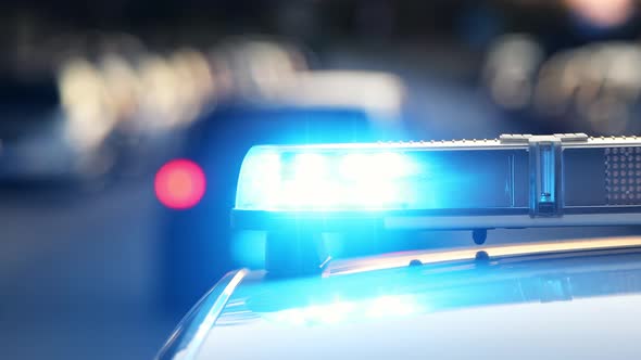 Siren Light On Roof Of Police Car   