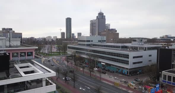 Aerial: Overcast morning over Amstel Station in Amsterdam alt