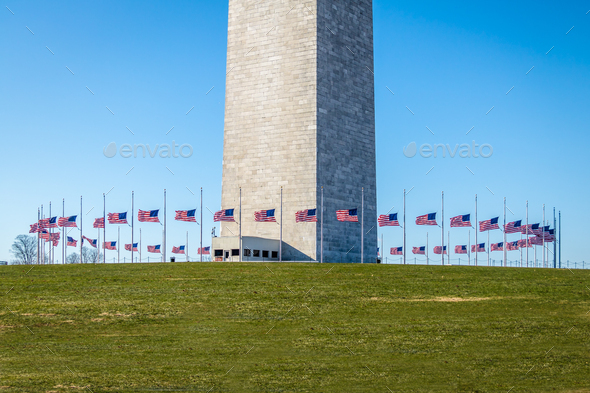United States flags around base of Washington Monument - Washington, D.C., USA