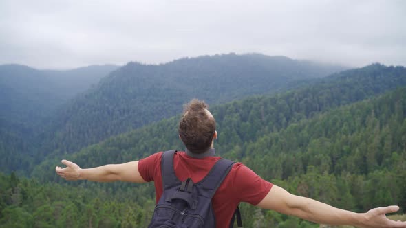 The man who takes a deep breath at the summit. alt