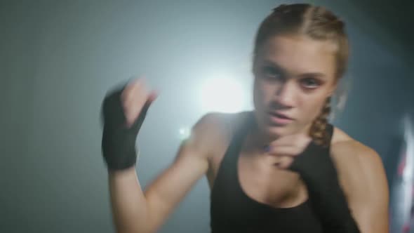 Slow Motion Female Fighter Trains His Punches and Defense Training in the Boxing Gym Woman Power alt