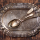Vintage spoon on vintage plate. Vintage cutlery - PhotoDune Item for Sale