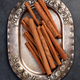 Cinnamon sticks on vintage plate - PhotoDune Item for Sale