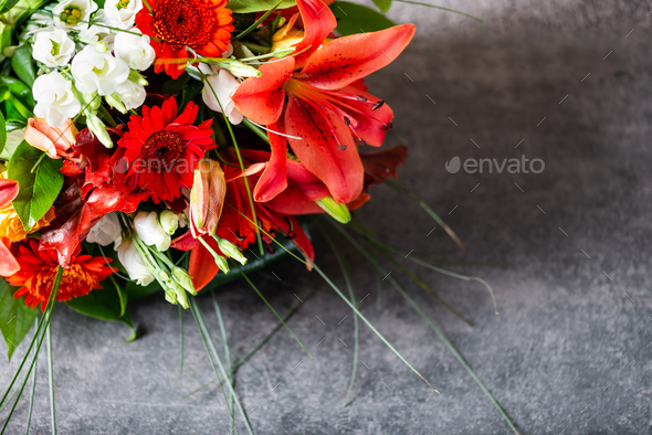 Vibrant Bouquet of orange Asiatic lilies and other flowers
