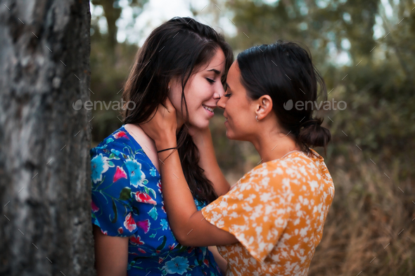Two Babe Lesbians Kissing And Caressing Each Other In The Woods Stock Photo By ManuReyes