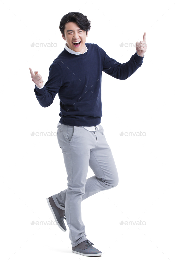 Humorous young man posing - Stock Photo - Images