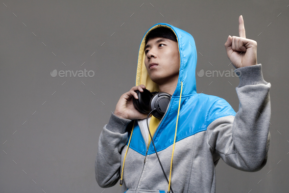 Guy in Hoodie with Index Finger Upraised