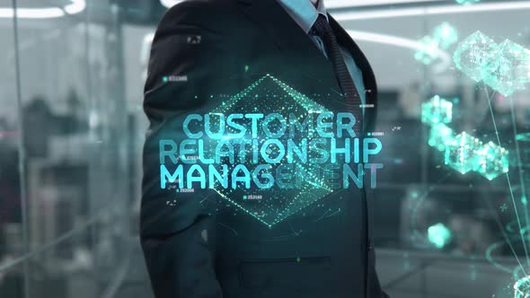 Businessman with Customer Relationship Management Hologram Concept alt