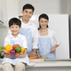 Family cooking in kitchen - PhotoDune Item for Sale