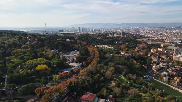 Aerial drone view of Barcelona city at daylight. Montjuic district. Spain alt