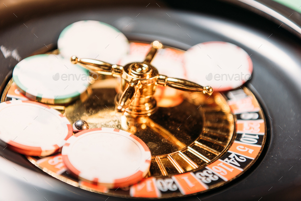 selective focus of roulette and casino chips in casino - Stock Photo - Images