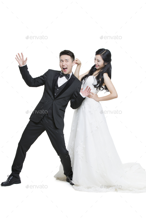 Humorous bride and groom - Stock Photo - Images