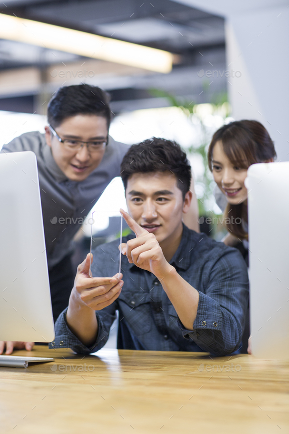 IT workers developing smart phone