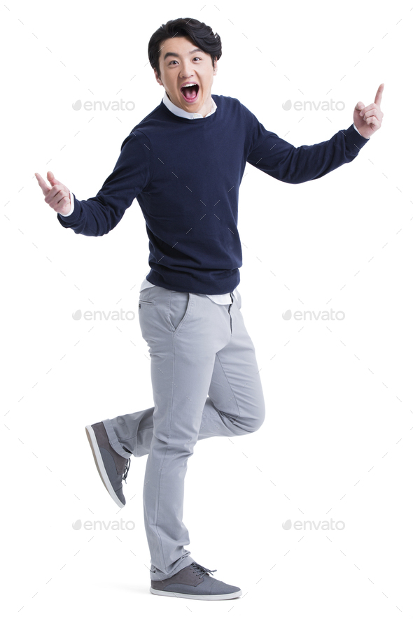 Humorous young man making a face - Stock Photo - Images