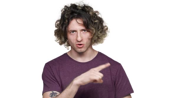 Portrait of Strongwilled Determined Man Shaking Finger in Denial and Being Definitely Disagree alt