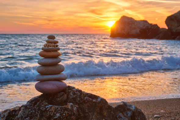 Concept of harmony and balance. Balance stones against the sea. Stock Photo