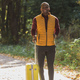 african american young man in stylish clothes with suitcase walks in an autumn park - PhotoDune Item for Sale