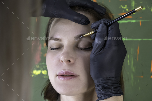 eyebrow lamination procedure styling, correction, coloring and in beauty salon