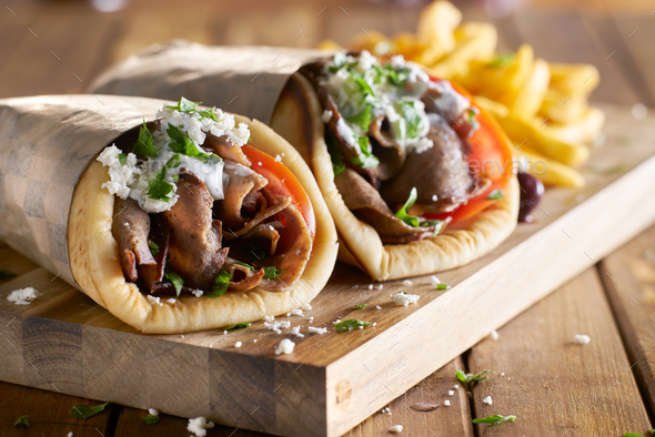 Two Greek Gyros With Shaved Lamb And French Fries Stock Photo By Joshua 