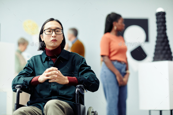 Young Man With Disability In Art Museum